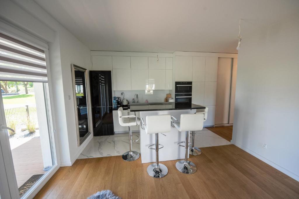 Apartament nad jeziorem w Iławie- mozliwość wynajęcia motorówki !! - Housity
