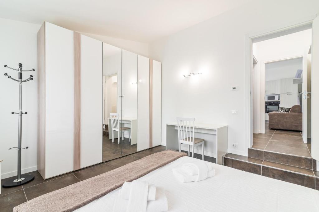 A bed or beds in a room at Spa and Relax Lovely Apartment