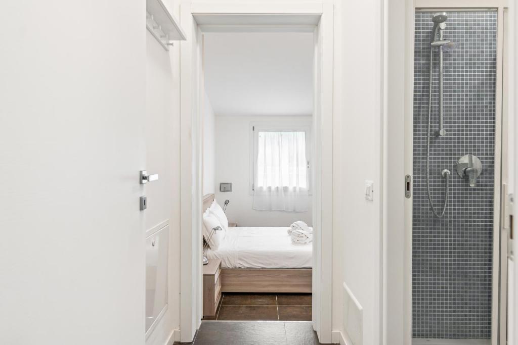 A bed or beds in a room at Spa and Relax Lovely Apartment