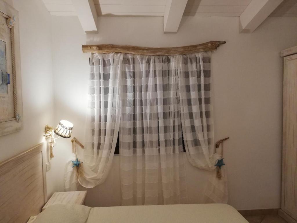 Postel nebo postele na pokoji v ubytování Hotel Tabby