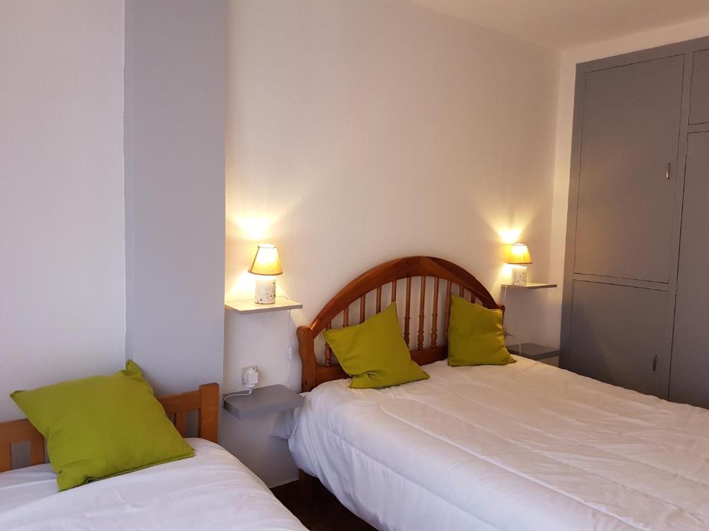 Postel nebo postele na pokoji v ubytování Apartamentos Grifovacances Consuegra 1
