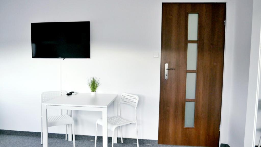 Televízia a/alebo spoločenská miestnosť v ubytovaní Astra Katowice - Aparthotel