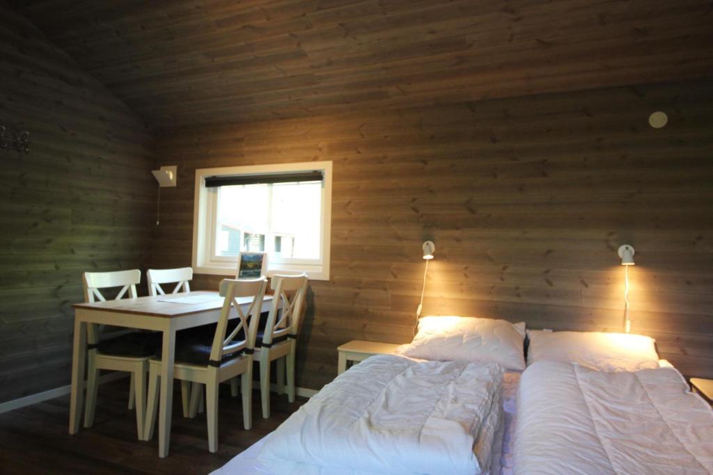 Postel nebo postele na pokoji v ubytování Trollstigen Resort
