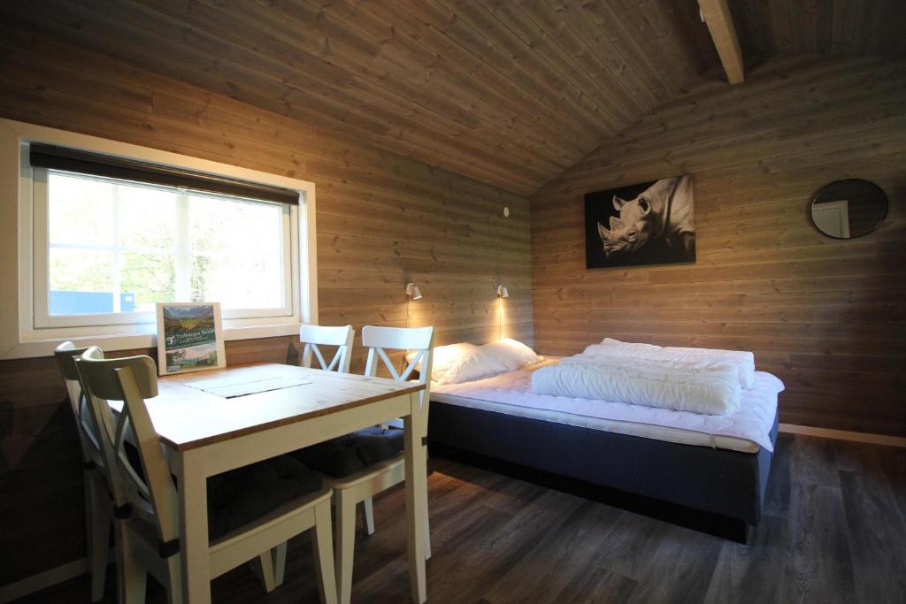 Postel nebo postele na pokoji v ubytování Trollstigen Resort