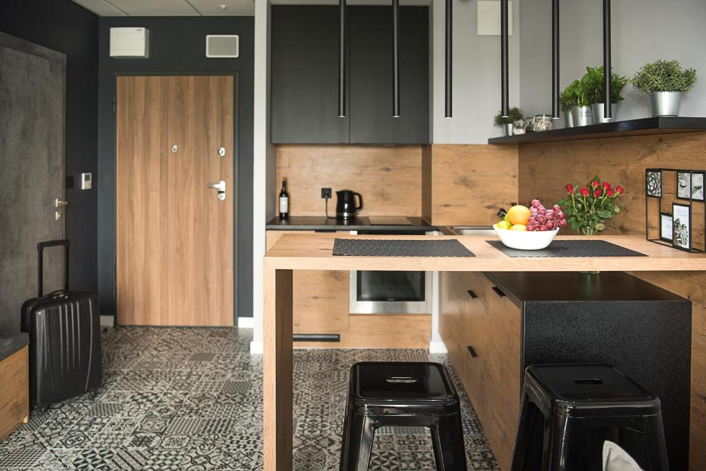 Kuchyňa alebo kuchynka v ubytovaní Wola Loft Apartment