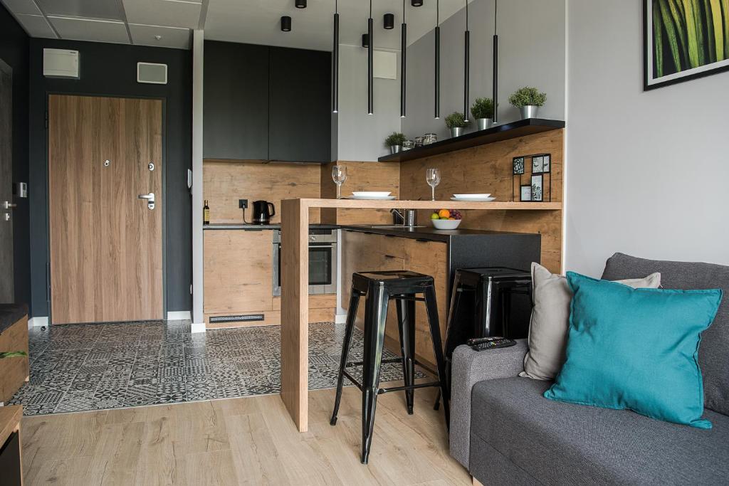 Kuchyňa alebo kuchynka v ubytovaní Wola Loft Apartment