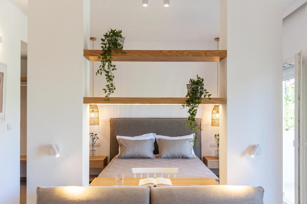 Postel nebo postele na pokoji v ubytování Christa Luxury Apartments