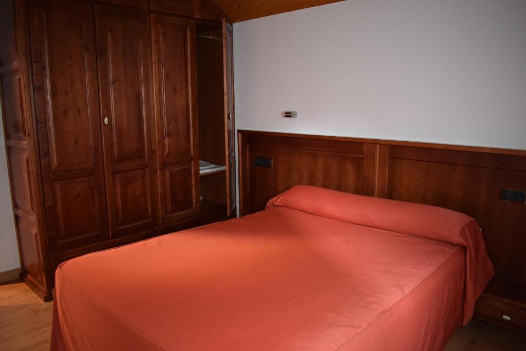 Cama o camas de una habitación en Apartamentos VIDA Corcubión