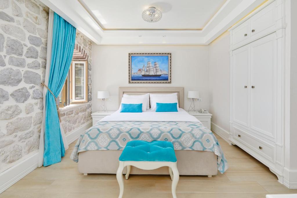 Ein Bett oder Betten in einem Zimmer der Unterkunft Hotel Libertas
