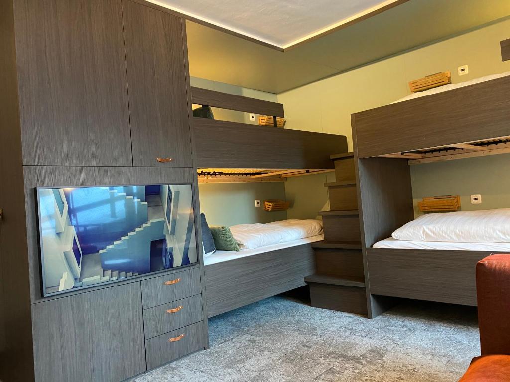 Postel nebo postele na pokoji v ubytování Hotel Les Etagnes