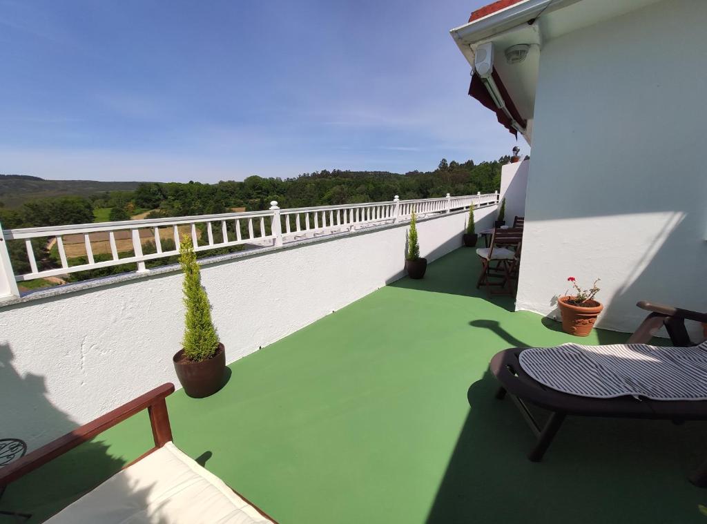 Un balcón o terraza de Hostal-Restaurante Paris