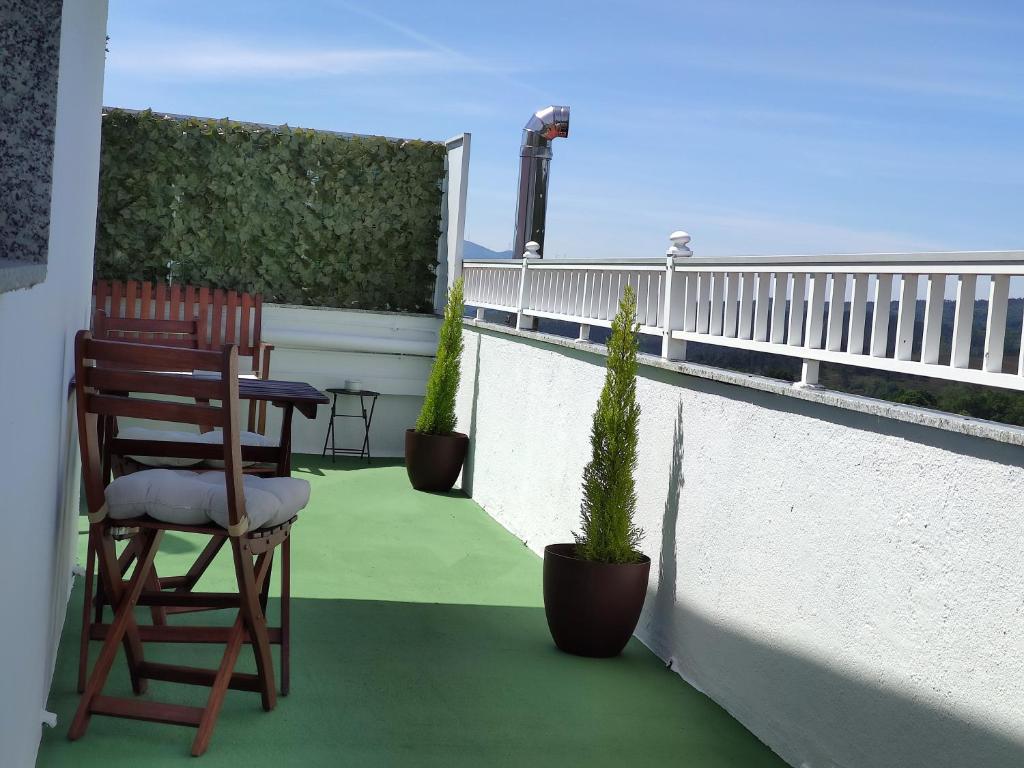 Un balcón o terraza de Hostal-Restaurante Paris
