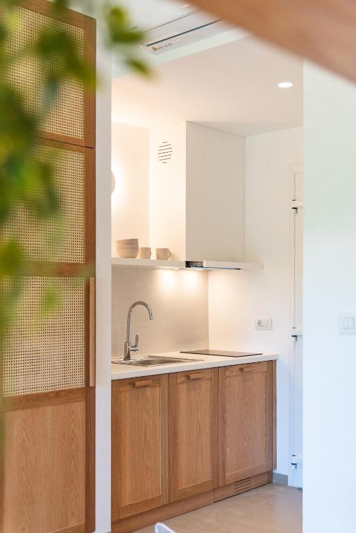 Kuchyň nebo kuchyňský kout v ubytování Christa Luxury Apartments