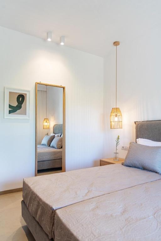 Postel nebo postele na pokoji v ubytování Christa Luxury Apartments