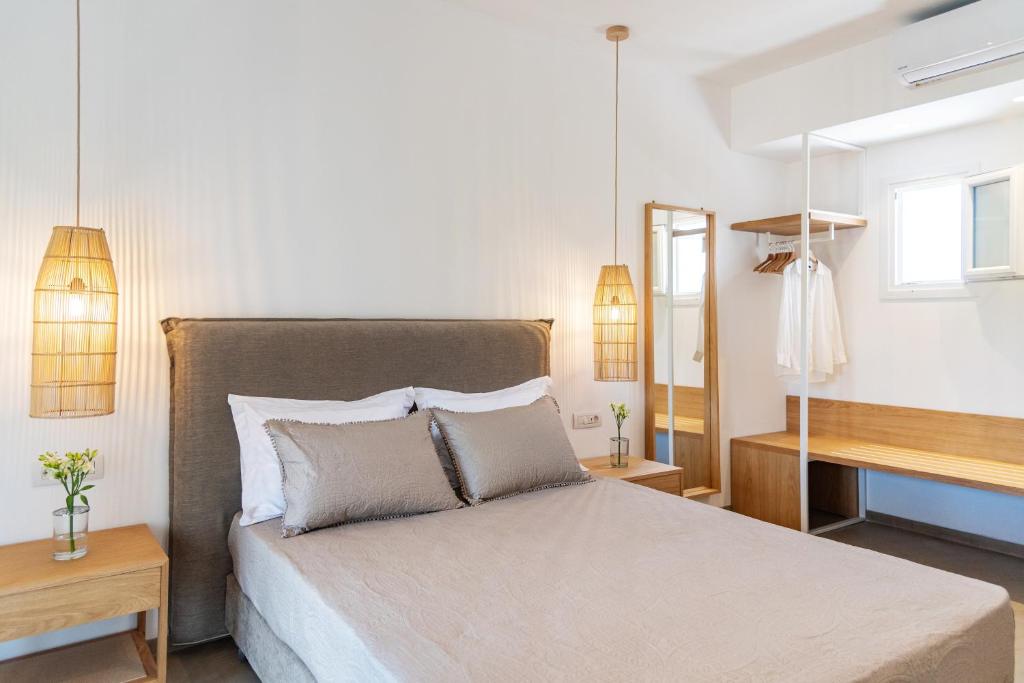 Postel nebo postele na pokoji v ubytování Christa Luxury Apartments