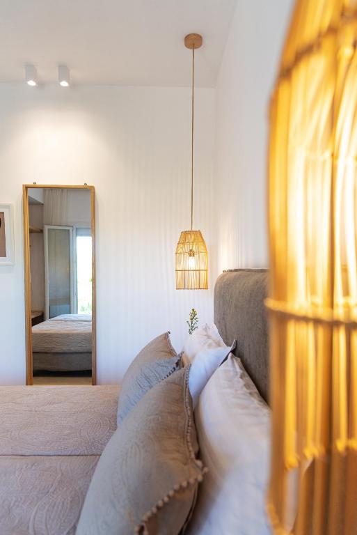 Postel nebo postele na pokoji v ubytování Christa Luxury Apartments
