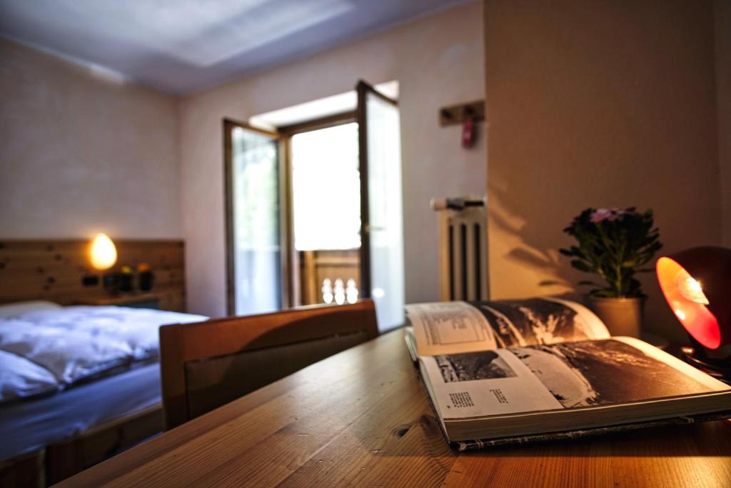 Postel nebo postele na pokoji v ubytování Hotel Gembro