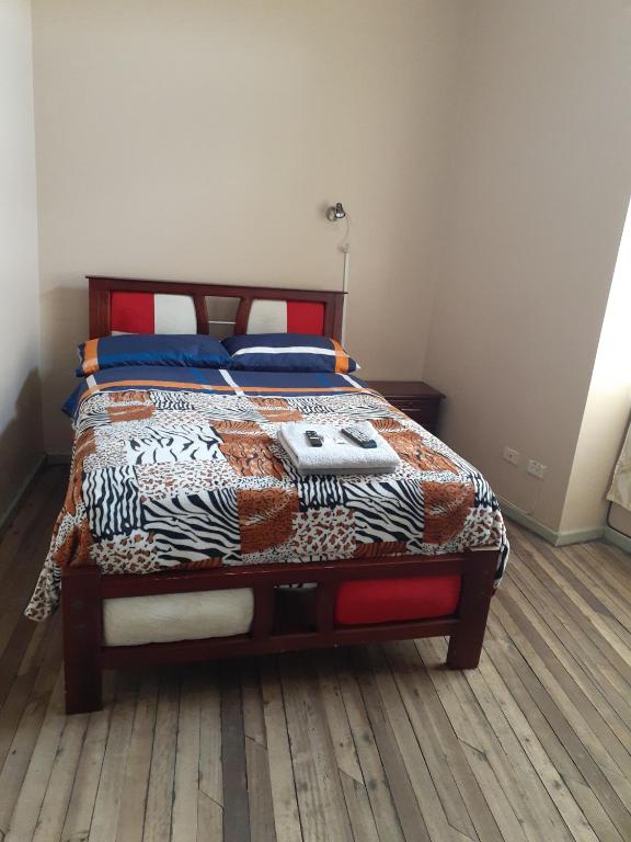 Postel nebo postele na pokoji v ubytování Hostal Mediodia