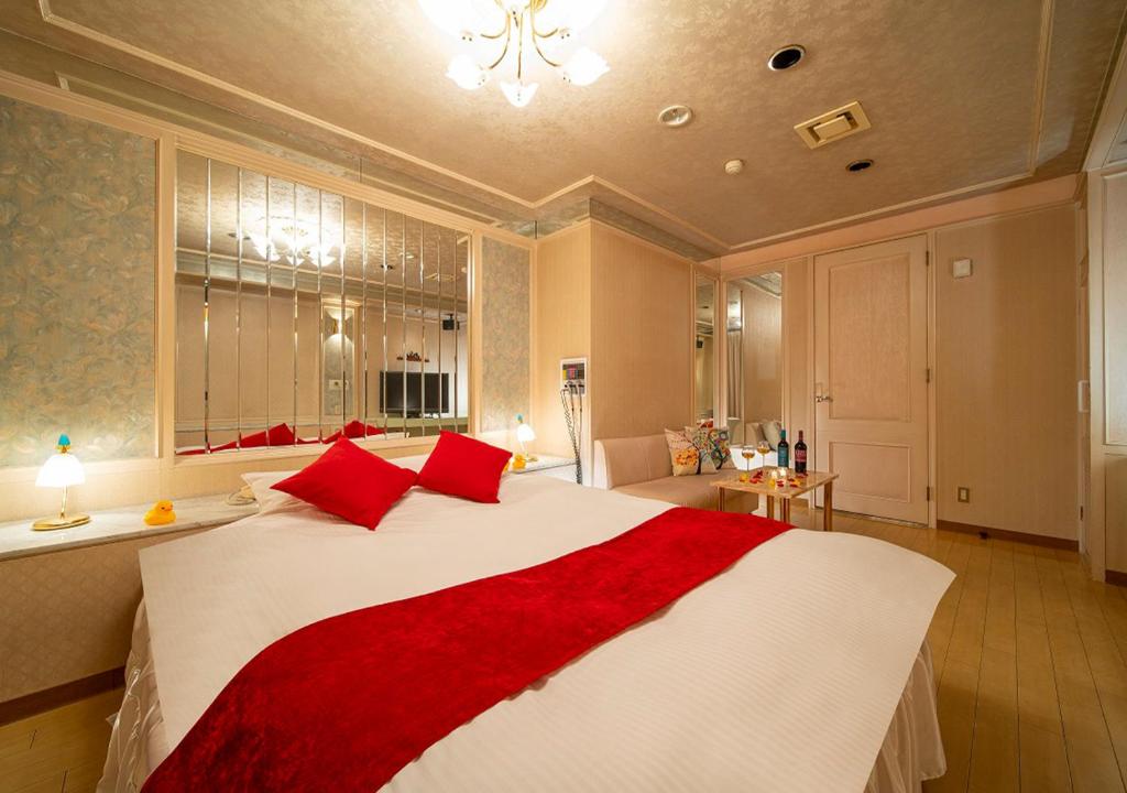 Postel nebo postele na pokoji v ubytování HOTEL&SPA SIESTA ( Adult Only)