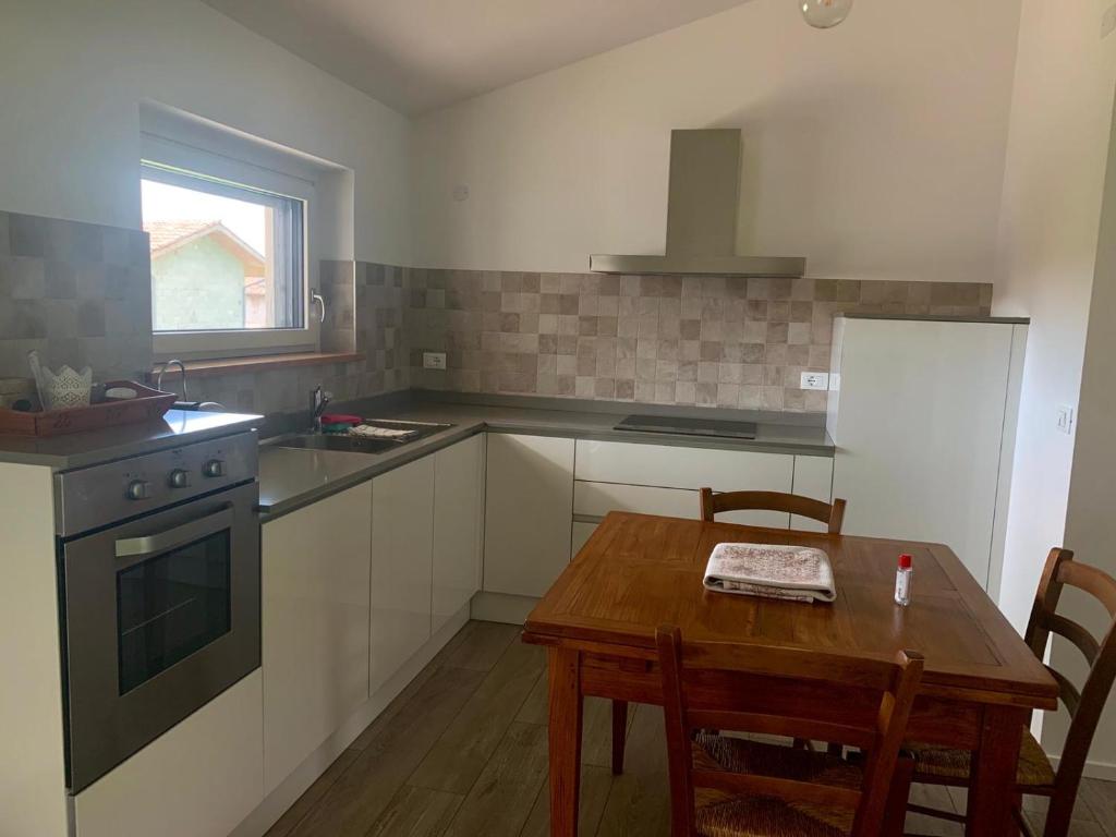 Kuchyň nebo kuchyňský kout v ubytování Cottage del fiume