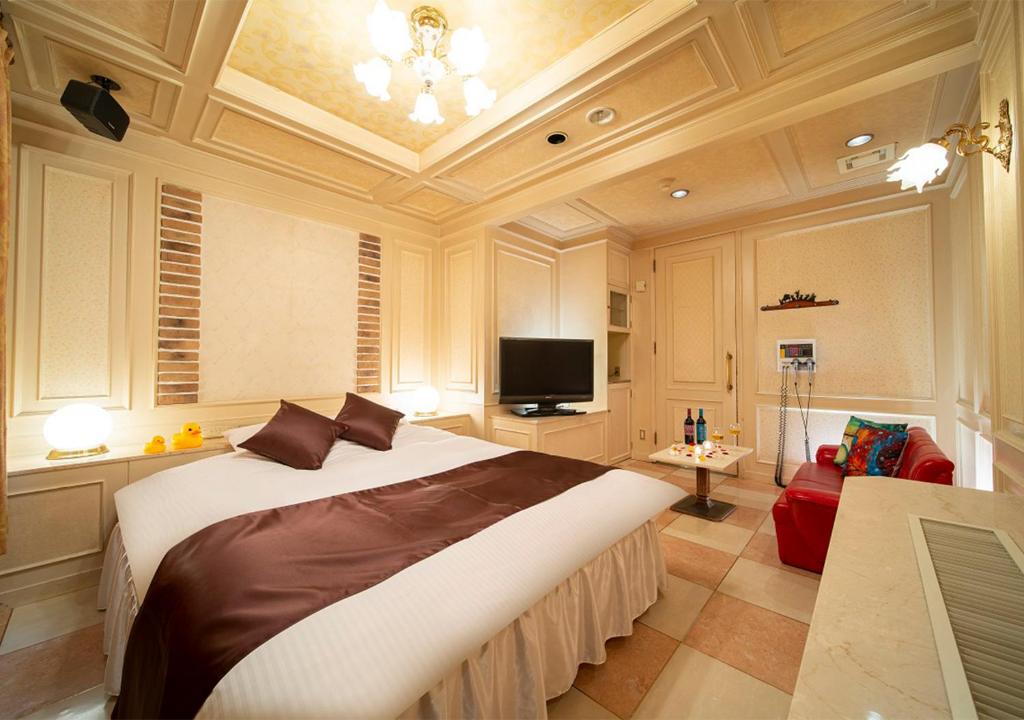 TV a/nebo společenská místnost v ubytování HOTEL&SPA SIESTA ( Adult Only)