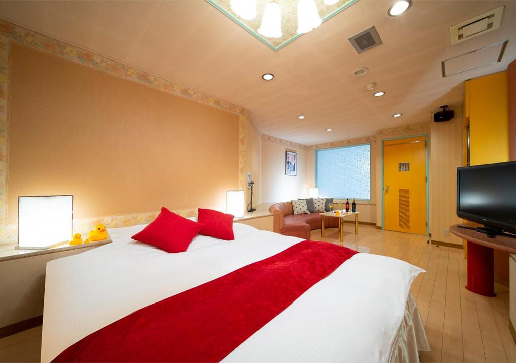 TV a/nebo společenská místnost v ubytování HOTEL&SPA SIESTA ( Adult Only)