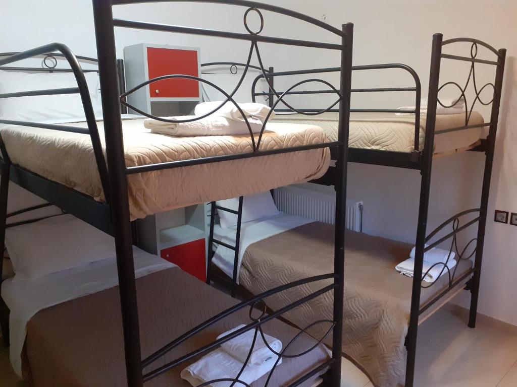 A bed or beds in a room at Villa Gogo offers privacy and pool