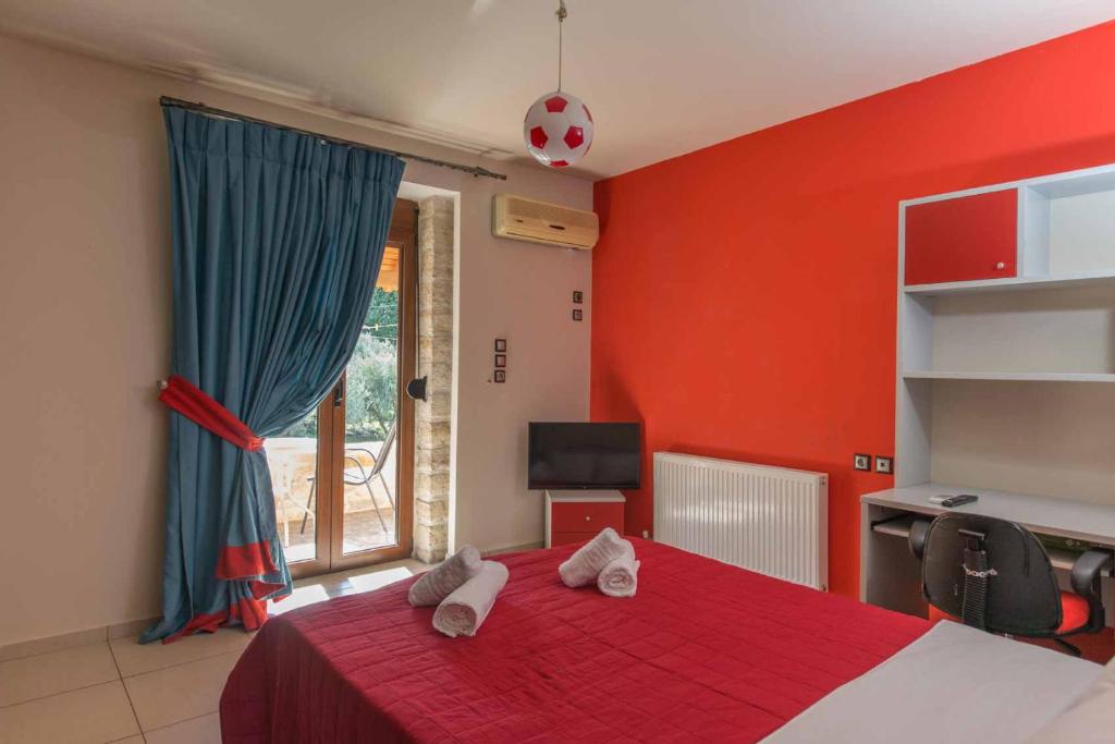 A bed or beds in a room at Villa Gogo offers privacy and pool