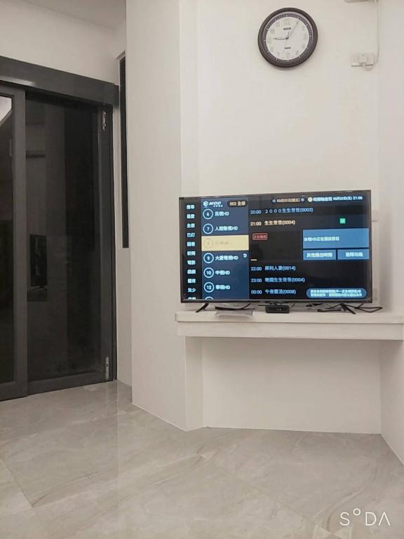 TV a/nebo společenská místnost v ubytování Penghu Summer Aroma Homestay