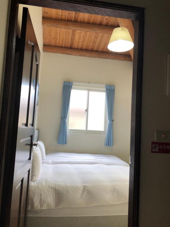 Fotografie z fotogalerie ubytování Jinsha Vanilla Homestay v destinaci Nangan