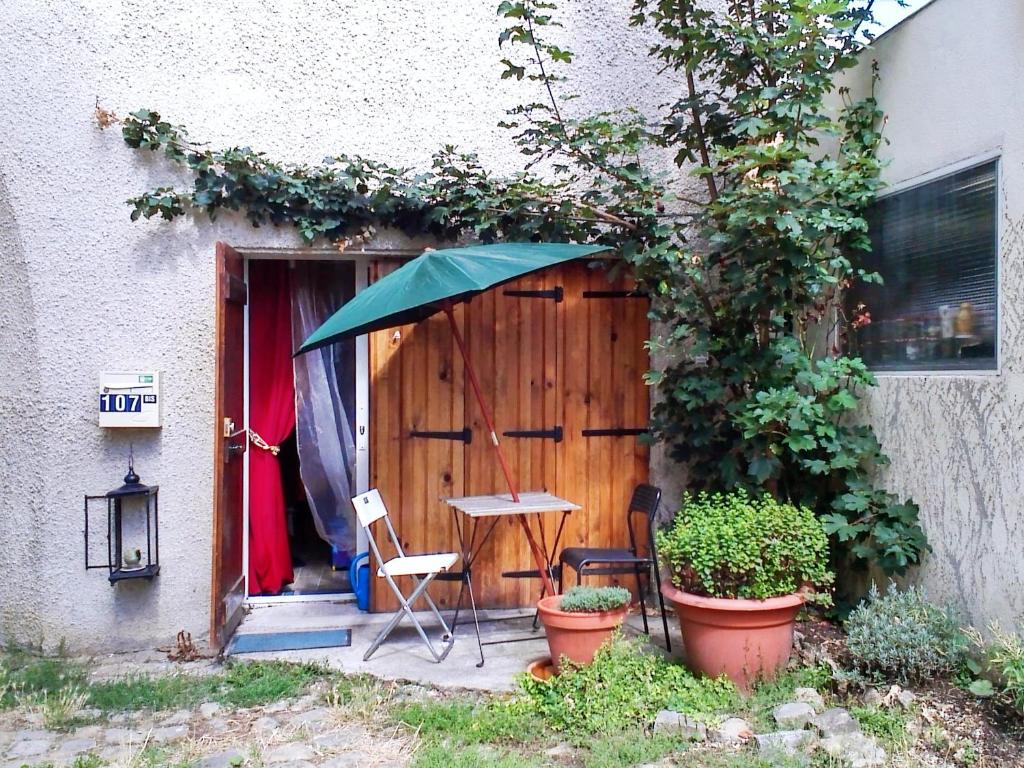 Photo de la galerie de l'établissement Maison d'une chambre avec jardin a Le Chesnay, à Le Chesnay