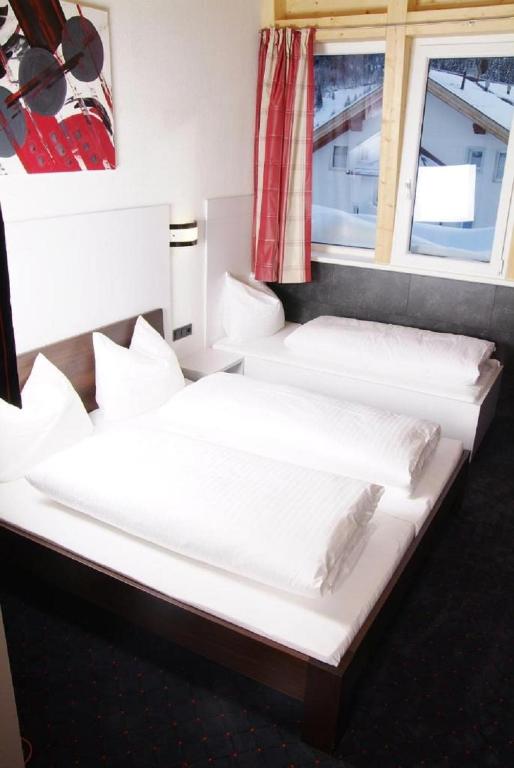 Posteľ alebo postele v izbe v ubytovaní Astellina hotel-apart