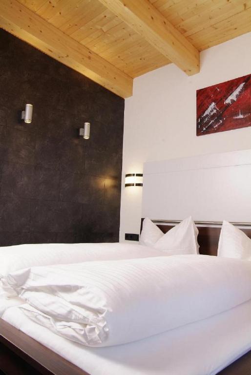 Posteľ alebo postele v izbe v ubytovaní Astellina hotel-apart