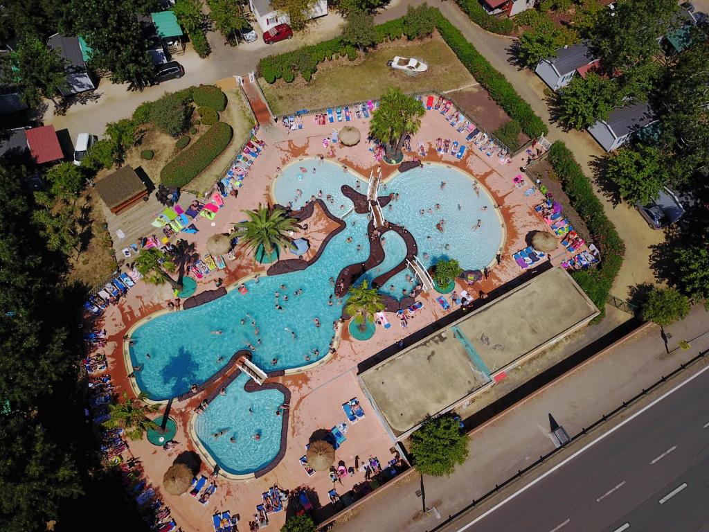 an overhead view of a pool at a resort at Camping Les Salisses - Maeva in Vias