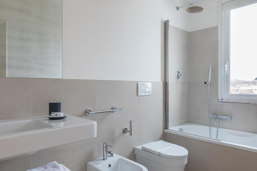 Kúpeľňa v ubytovaní Amazing penthouse with private terrace in Trastevere