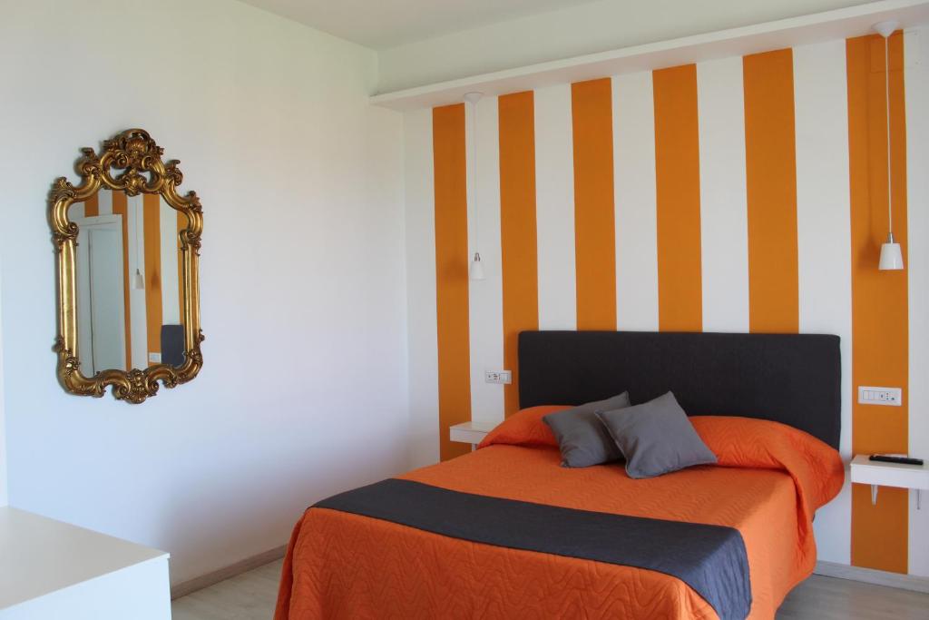 Postel nebo postele na pokoji v ubytování Sunset rooms