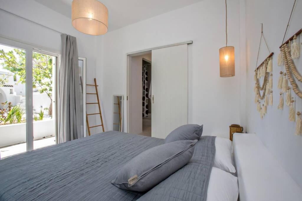 Łóżko lub łóżka w pokoju w obiekcie Beachside Villa Agios Sostis
