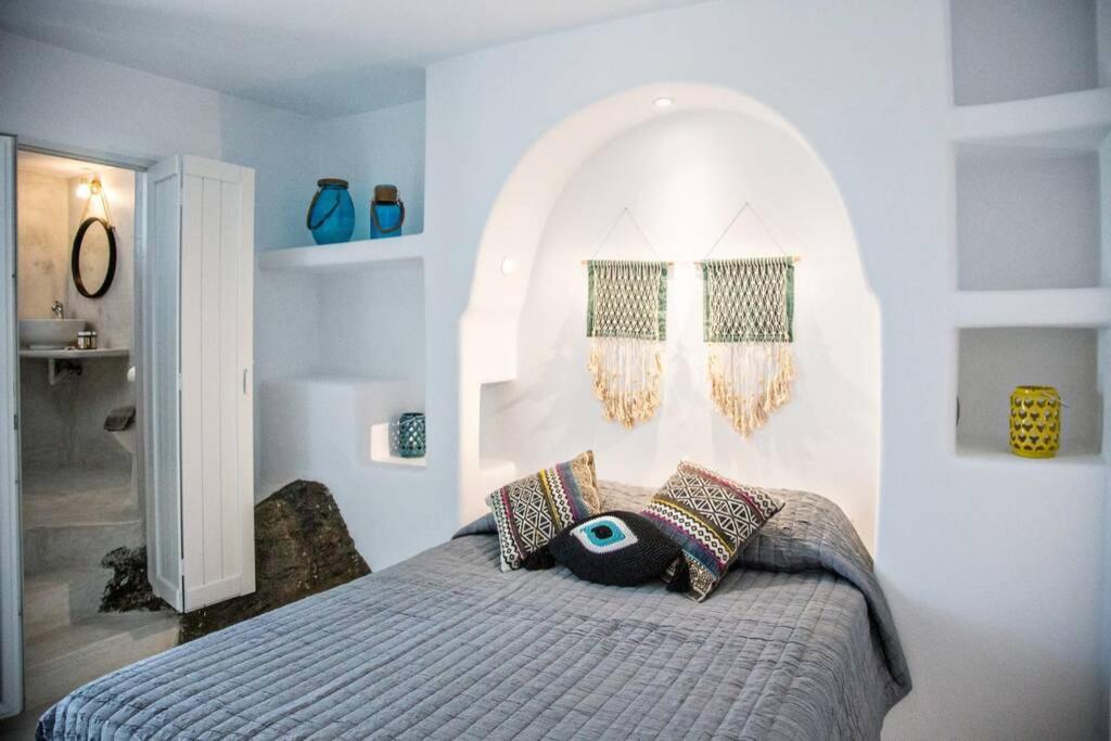 Łóżko lub łóżka w pokoju w obiekcie Beachside Villa Agios Sostis