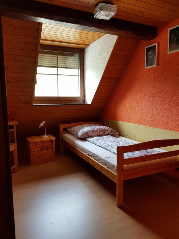 Postel nebo postele na pokoji v ubytování Garni-Hotel Mühletal