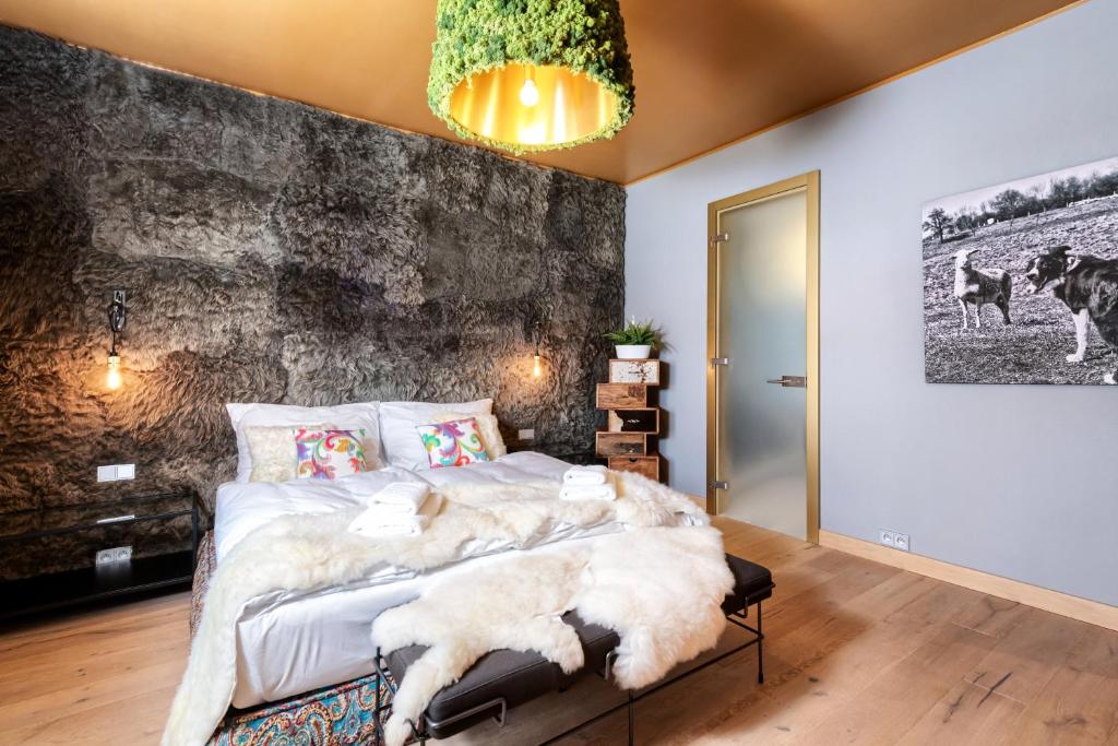 Postel nebo postele na pokoji v ubytování Oblík Resort
