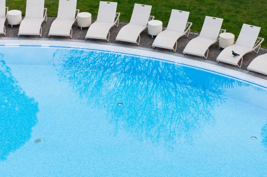 Het zwembad bij of vlak bij Villa Nicolli Romantic Spa Resort - Adults Only