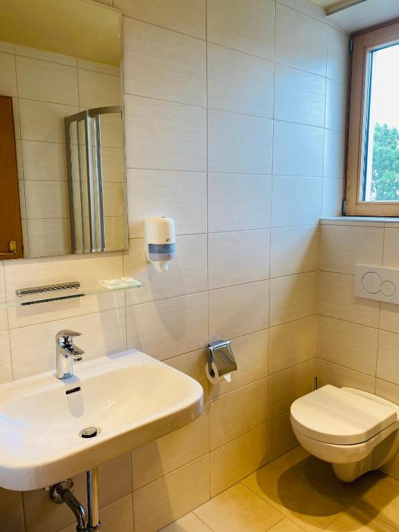Koupelna v ubytování Hotel Charlotte
