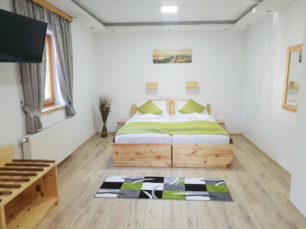 Postel nebo postele na pokoji v ubytování Pansion House Prijeboj