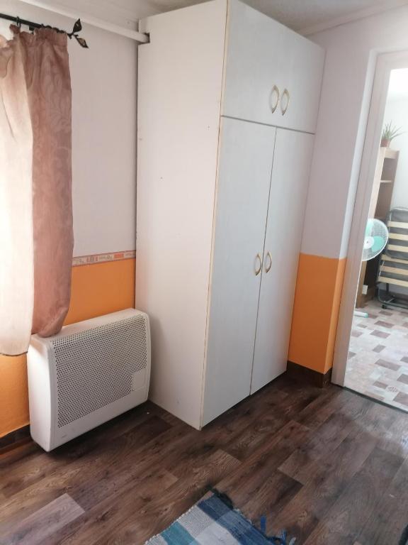 Posteľ alebo postele v izbe v ubytovaní Nagyi Vendégház Kecskemét