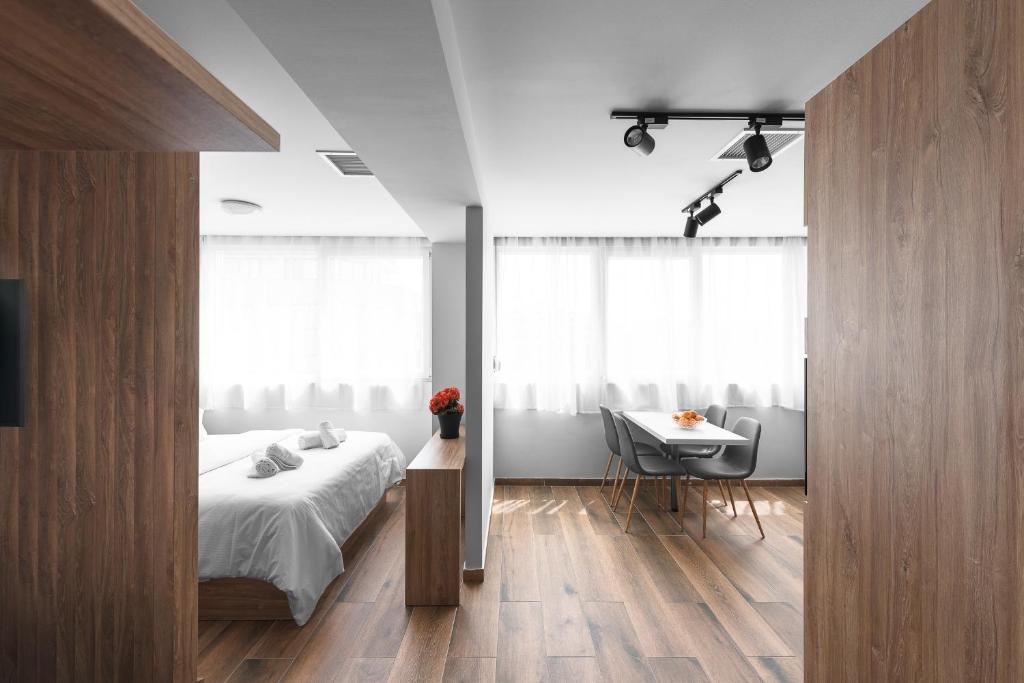 Posteľ alebo postele v izbe v ubytovaní Ultima, Nilie Hospitality MGMT
