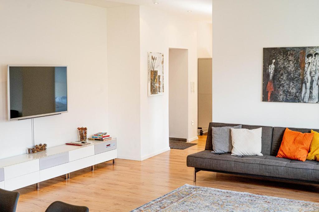 TV a/nebo společenská místnost v ubytování Am Spittlerturm