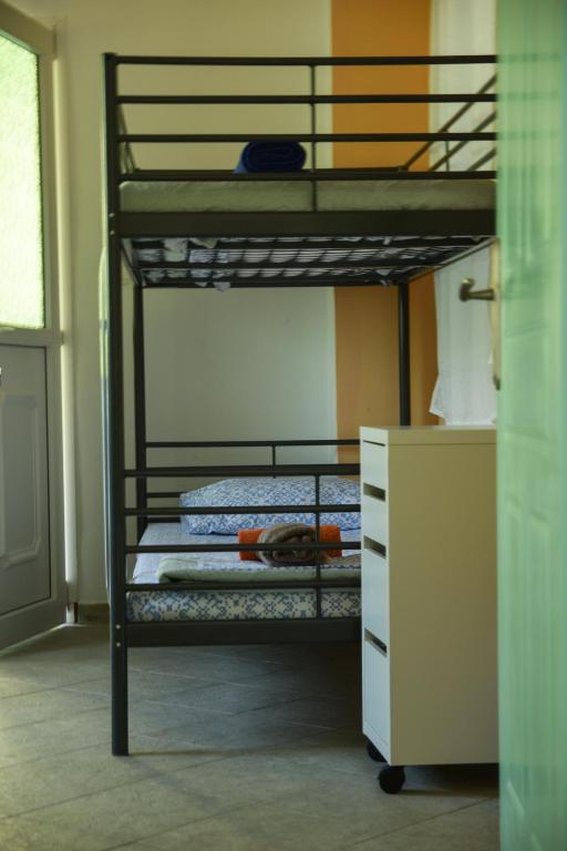 Postel nebo postele na pokoji v ubytování PortoAgali