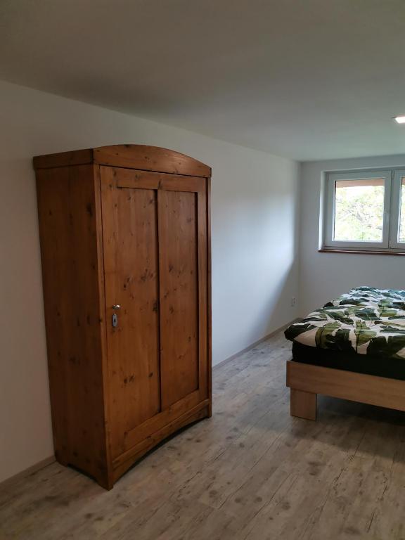 Postel nebo postele na pokoji v ubytování Apartmány Svatá