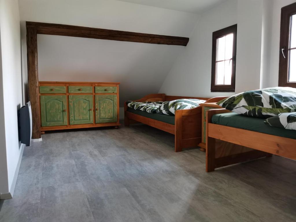 Postel nebo postele na pokoji v ubytování Apartmány Svatá