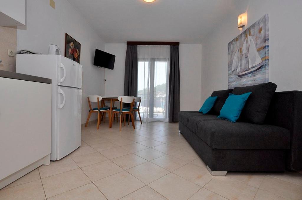 Kuchyň nebo kuchyňský kout v ubytování Apartmani More